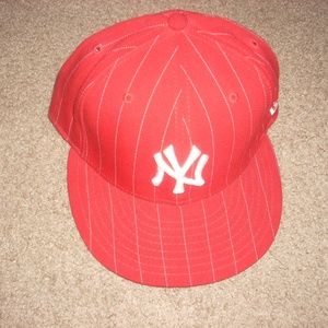 New Era hat.